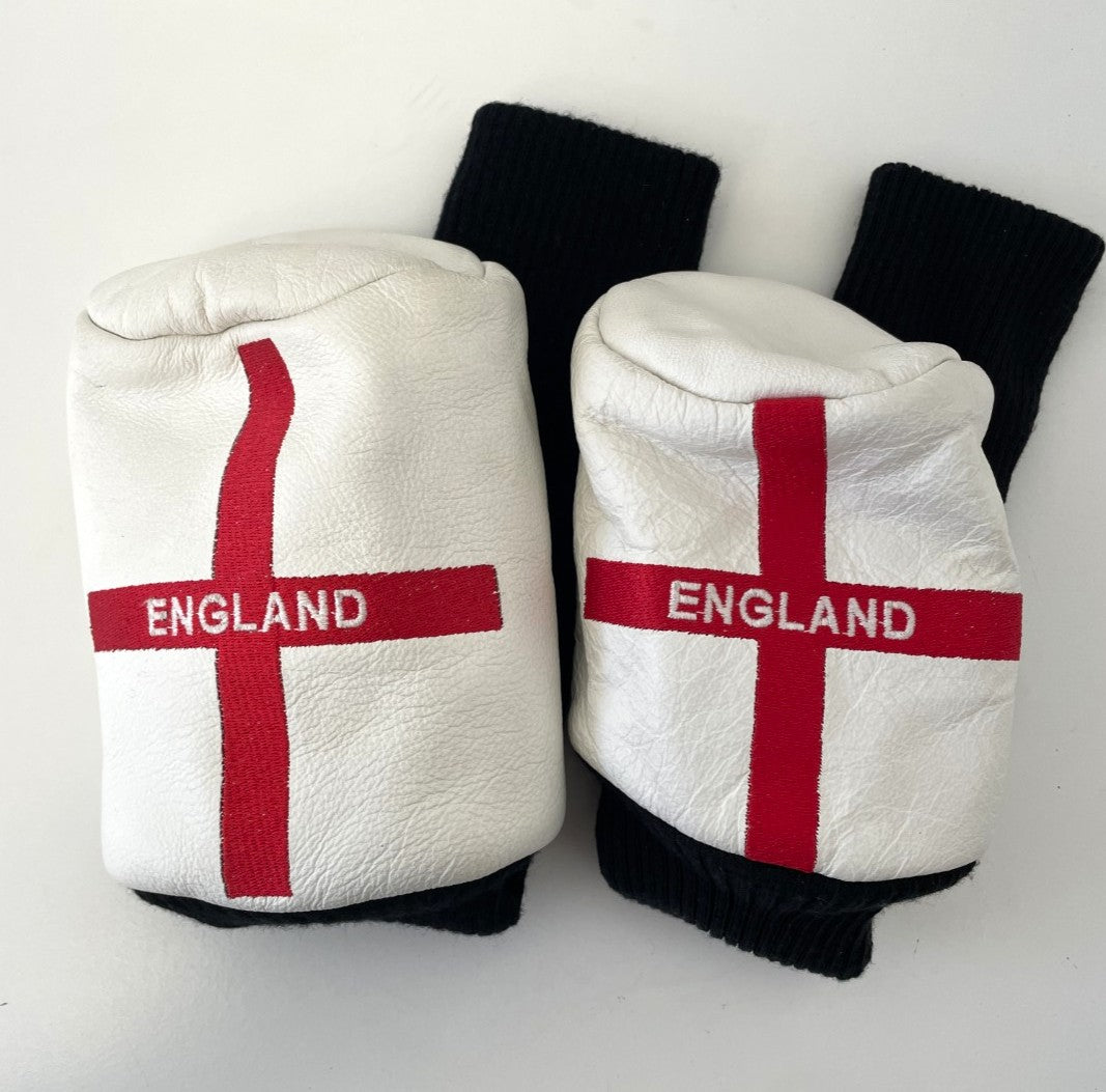 A Set of Leather England Headcovers