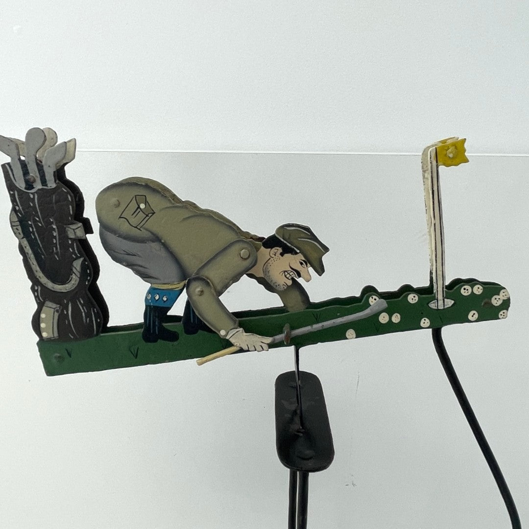 Pendulum Balance Figure - Golfer Lining Up His Putt